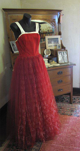 Image of long red gown depicted on a mannequin